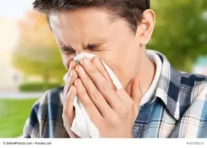 Man sneezing in Savannah, GA