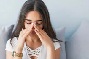 Woman with sinusitis