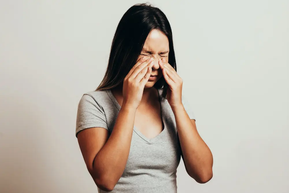 woman with sinus pressure.