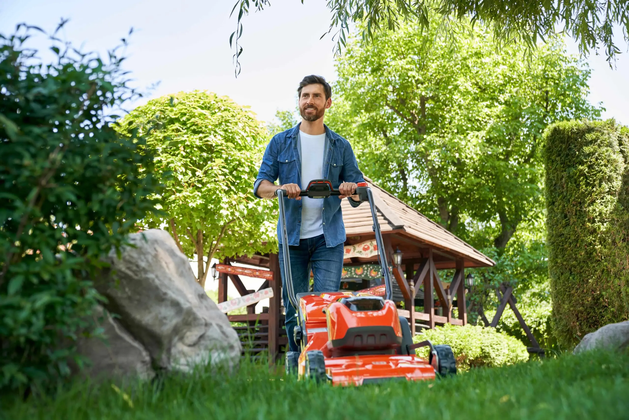 Man cutting grass.